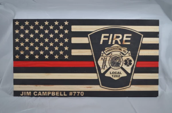 custom wood flag featuring thin red line and Anderson Fire Department patch.