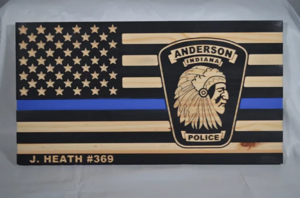 custom wood flag featuring thin blue line and Anderson Police department patch.